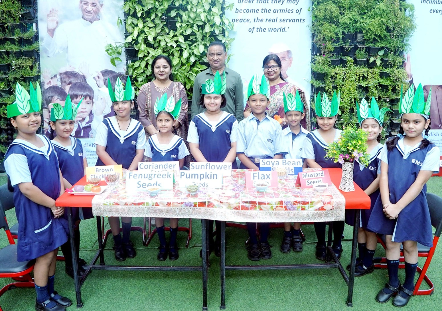 Students of the campus, presenting their Project-Based Learning (PBL) Kitchen Garden activity to Corporator Mr Laeeq Aaga during the inauguration of the newly constructed Activity Centre, Robotics Lab and Chemistry Lab, accompanied by Ms Archana Pandey (Principal, CMS Asharfabad).