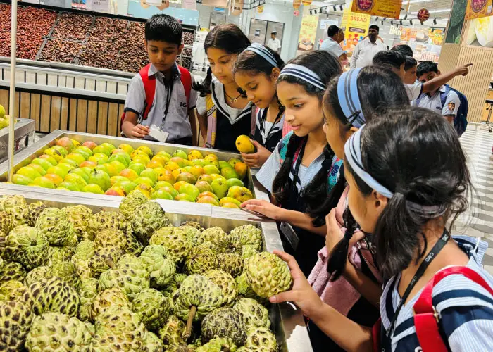 Students witnessing supermarket operations on their trip to Lulu Hypermart