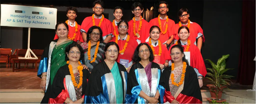 AP Exam Achievers with Prof. Geeta Gandhi Kingdom (CMS Manager), Senior CMS Leaders, and Principals