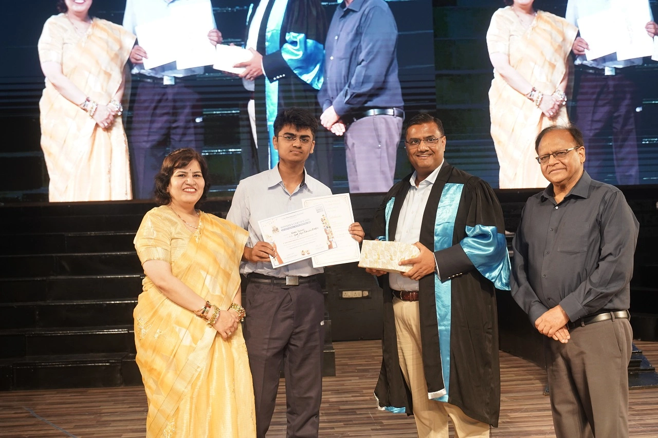 CMS Gomti Nagar Campus II Student Ishaan Dwivedi receiving the third prize for the Ram Ugrah Memorial Cartoon Contest 2026 from ‘Guest of Honour’ Shri Prakash Gupta, IFS.